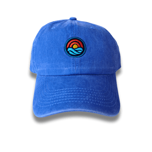 GORRA AZUL PRELAVADA ACID WASH BORDADA MAR.