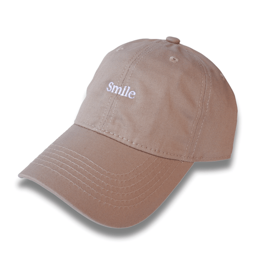 GORRA BEIGE BORDADA SMILE.